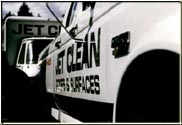A neat photograph with the mirrored name "Jet Clean" reflecting the light.