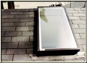 This photograph represents a simple “swap out” of an old leaking skylight with a new skylight.